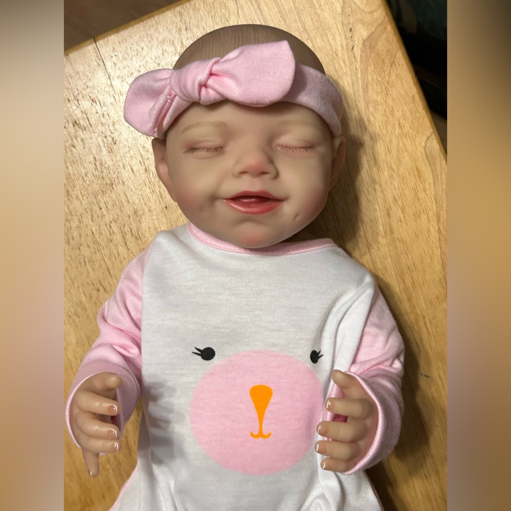 Adorable Reborn Baby Doll with Pink Outfit